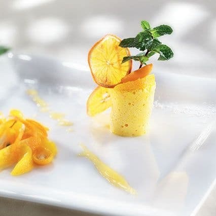 Budino di ricotta con salsa di arance