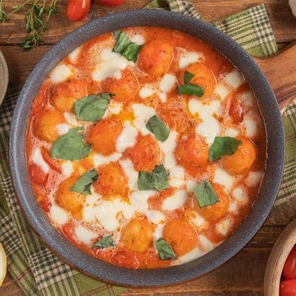 Polpette di baccalà con datterini e mozzarella filante